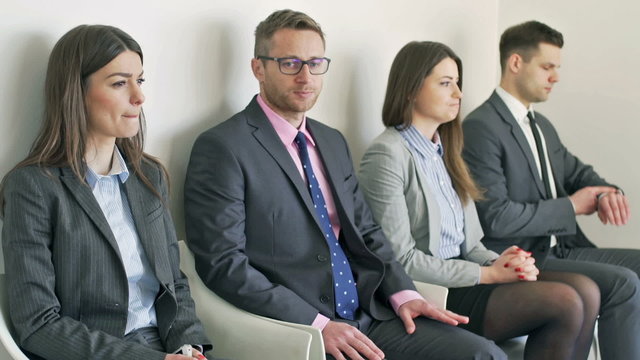 Nervous businesspeople waiting for interview
