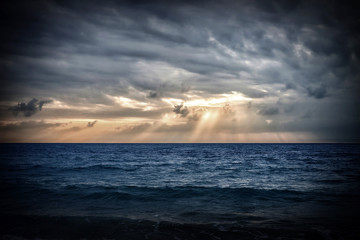 Storm on the sea. Sunrise in Thailand.