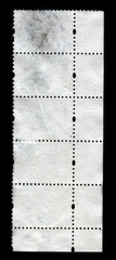 Reverse side of a postage stamp.