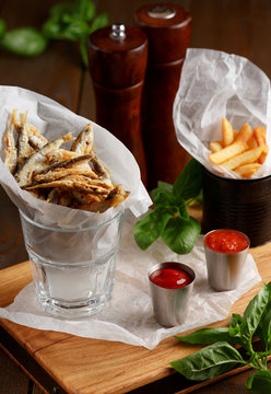 Sprat and french fries with gravy