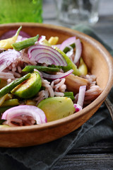 Rice with vegetables in a clay bowl