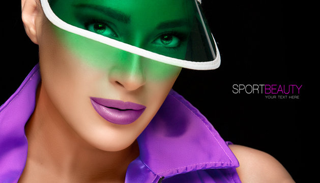 Beautiful Fashion Model Girl in Green Sun Visor. Beauty sporty concept