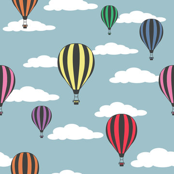 Colorful hot air balloons on the cloudy sky