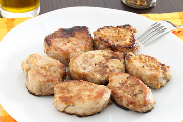 Roasted pork fillet in white plate