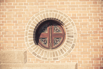 Circle window on the brick wall in vintage style