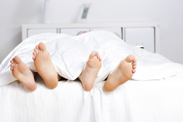 Obraz na płótnie Canvas Couple in bed