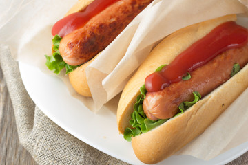 Hotdogs on wooden table