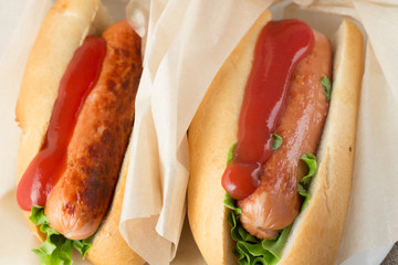 Hotdogs on wooden table