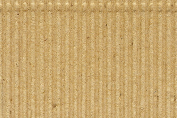 Corrugated cardboard goffer paper texture, bright rough old recycled background