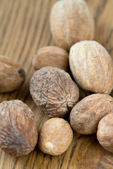 nutmeg on wooden surface