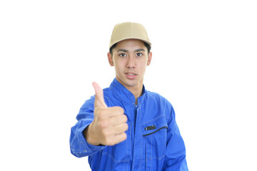 ガッツポーズの作業員