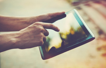 hands holding digital tablet pc