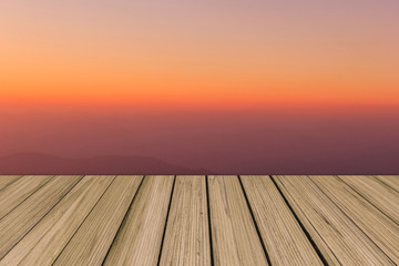 Fototapeta na wymiar Wooden floor background aspiring to soft color sky