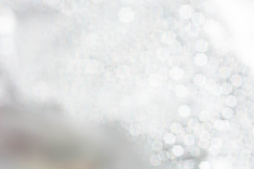 Silver background with bokeh lights