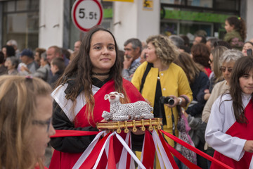 SAO BRAS DE ALPORTEL, PORTUGAL - April, 2015: Traditional religious procession of the flower torches event located in village of Sao Bras de Alportel, Portugal.