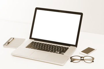 Laptop computer and office accessories with retro color effected