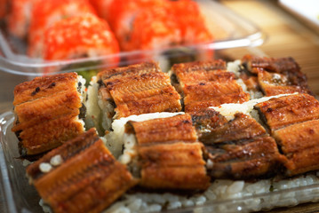 Sushi roll Philadelphia and Canada on table
