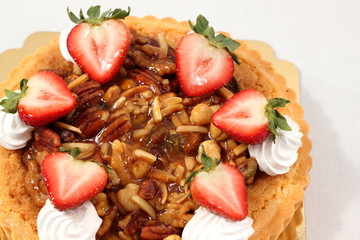  nut pie ontop cream  and  fresh strawberry