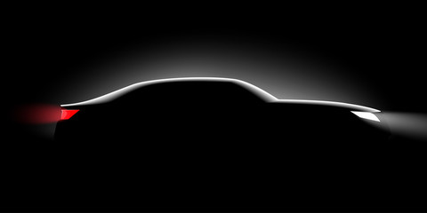 realistic business car silhouette in the dark