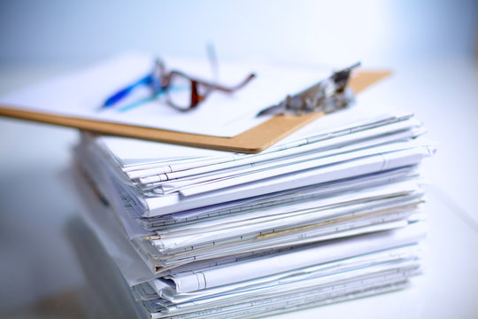 Big stack of papers ,documents on the desk