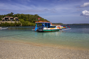 Fototapeta na wymiar public boats tied up at the beach, Nusa Penida, Indonesia