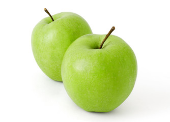 Two green apples on a white background