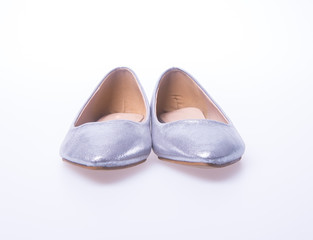 shoe. Silver colour fashion woman shoes on a background.