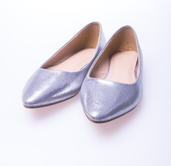 shoe. Silver colour fashion woman shoes on a background.