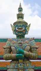Giant at Emerald Buddha temple, Bangkok, Thailand.