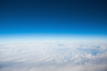 Flying above the clouds. view from the airplane