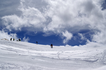 Naklejka na ściany i meble Ski slope in sun wind day