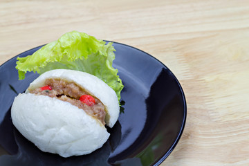 Chinese steamed bun with crab stick, quail egg and pork stuff