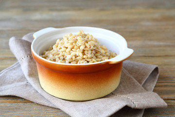 Porridge pearl barley in the pot