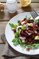 Salad with boiled beans on a plate