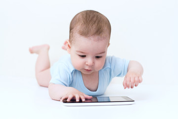 Beautiful baby with tablet