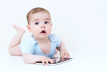 Beautiful baby with tablet