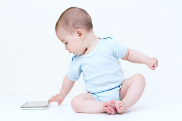 Beautiful baby with tablet