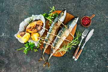 Grilled mackerel fish with baked potatoes