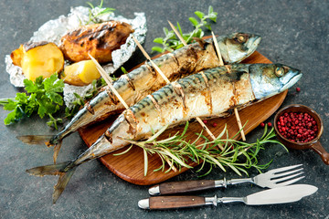 Grilled mackerel fish with baked potatoes