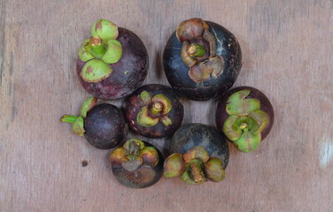 mangosteen on wood table