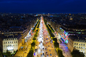 Streetview of famous Champs Elysees with illumination and traffic in Paris