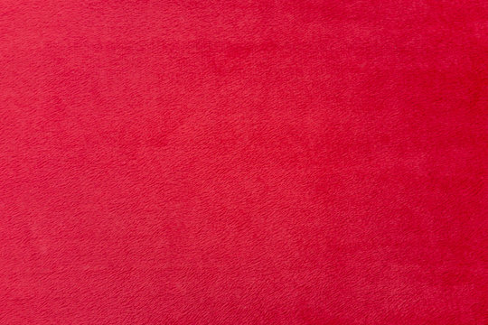 Red blanket texture and background.