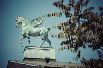 statue of pegasus on the roof of opera in poznan poland