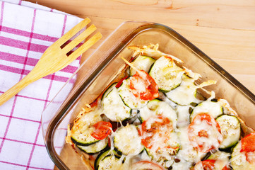 Tomatoes and zucchini baked with cheese