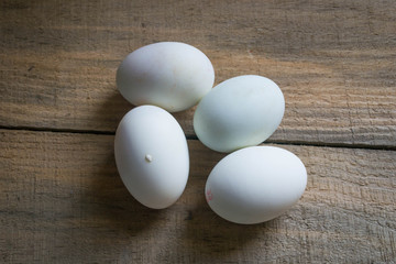 white eggs on a wooden background