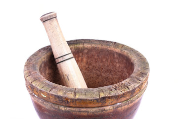 wooden mortar and pestle isolated on white background