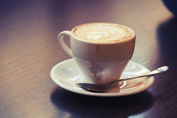 Cappuccino, cup of coffee with milk foam