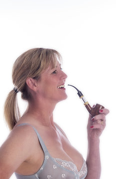 Mature woman smoking an electronic pipe