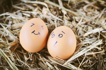 Painted eggs about emotion on the face