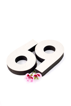 Sexy Number 69 and flower on white 